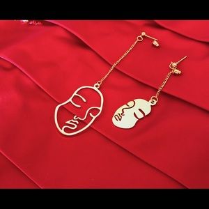 Gold color Face earrings